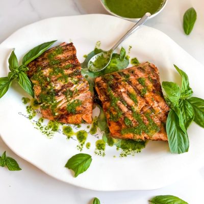 Grilled salmon with garlic and herb sauce